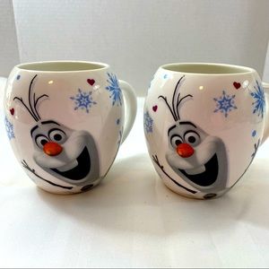 Enesco Canada Olaf mug set of 2. 1 mug has a bit of wear